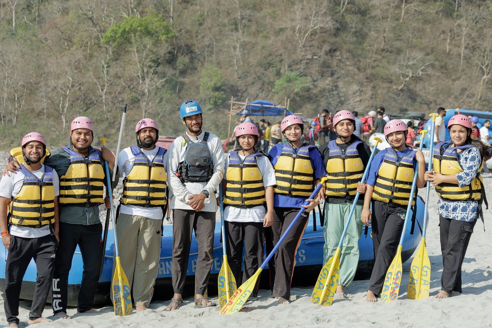 Rafting group posing together after a Ganga rafting run in Rishikesh