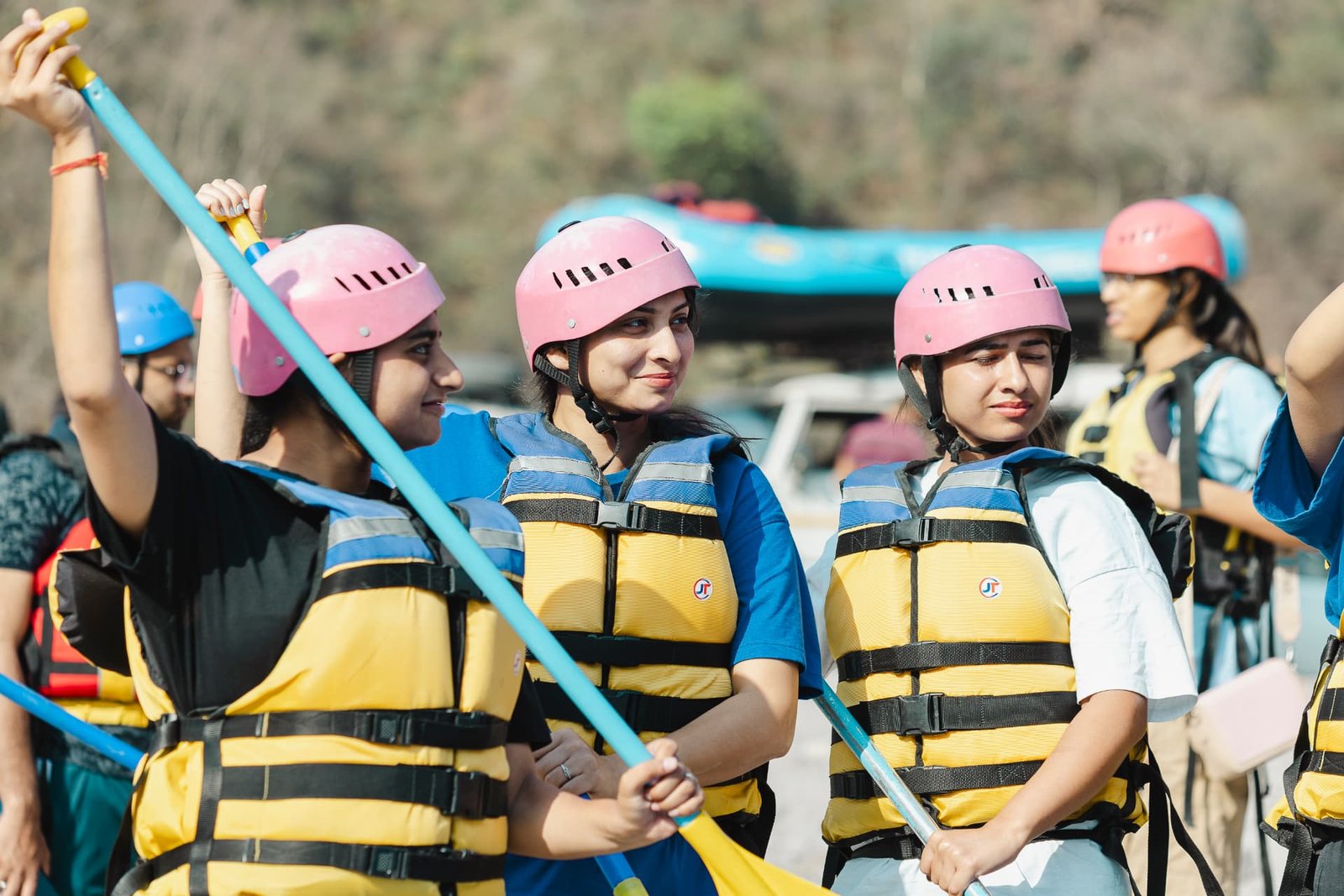 Rafting guide giving a safety briefing to a group before a Ganga rafting run in Rishikesh