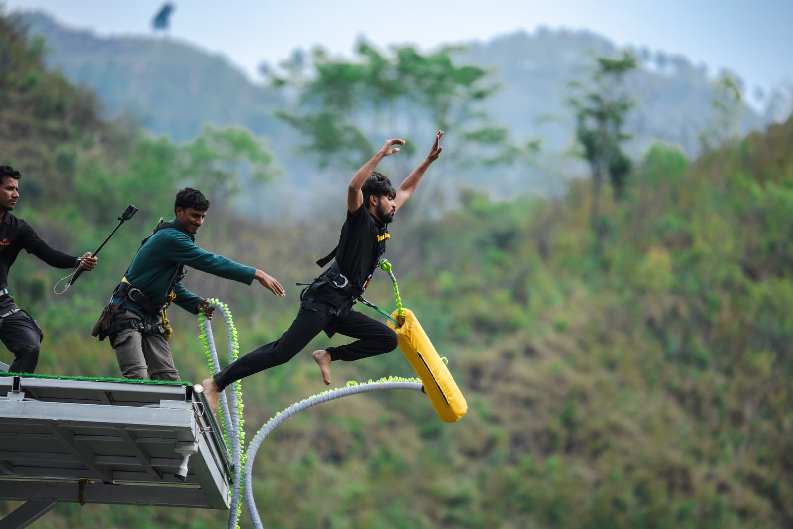 Jumper leaping head-first off the 219M Maa Ganga Bunjee platform in Rishikesh